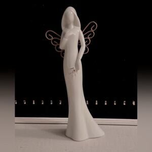 Vintage tall slim ceramic angel with gold detail wings and leaf details